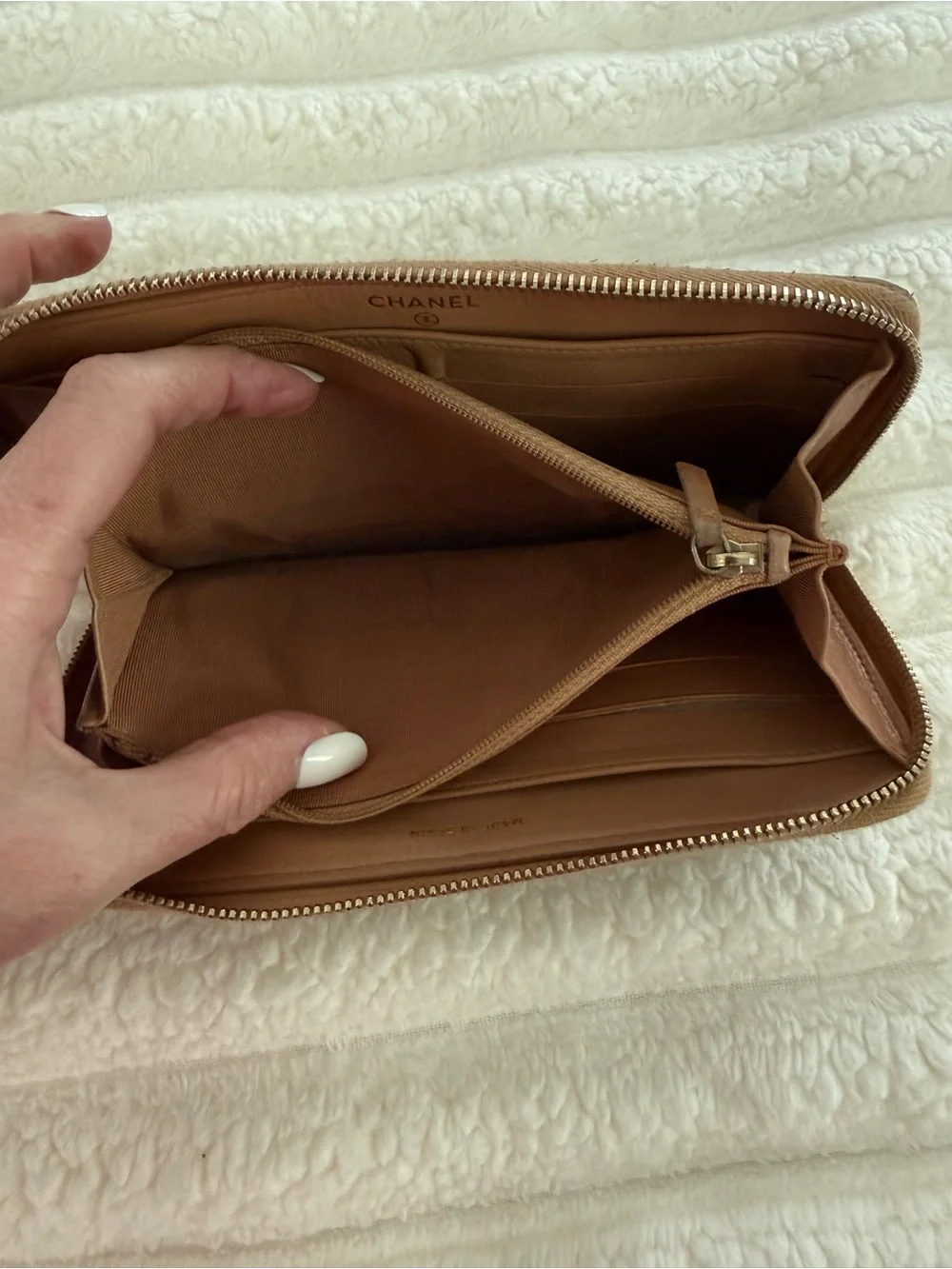 CHANEL Quilted Leather Zip Wallet in Brown with Gold CC